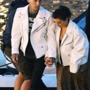 kourtney kardashian and travis barker wears matching White Jacket
